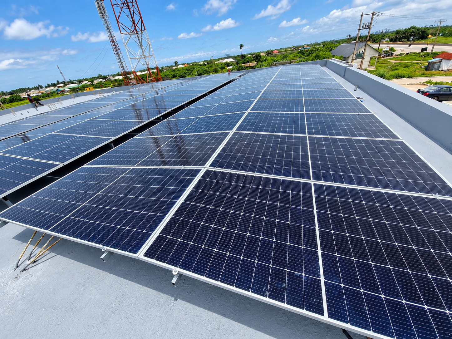 Rows of solar panels on a commercial roof