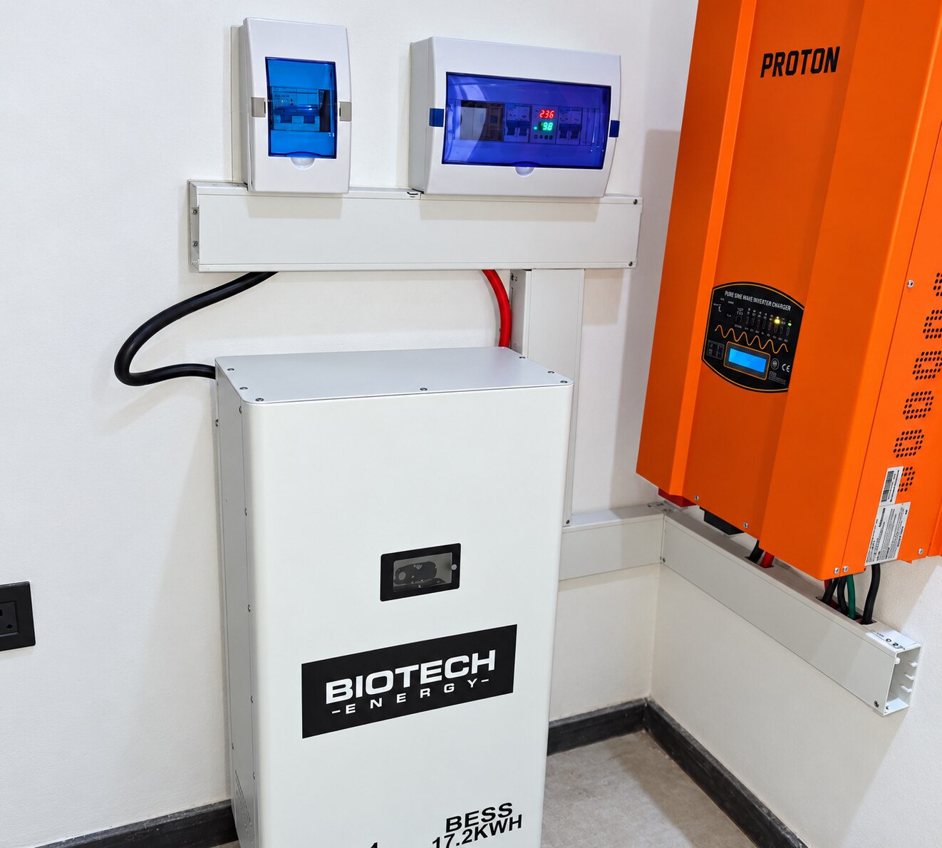 BIOTECH 17.2 kWh battery cabinet beside a Proton inverter