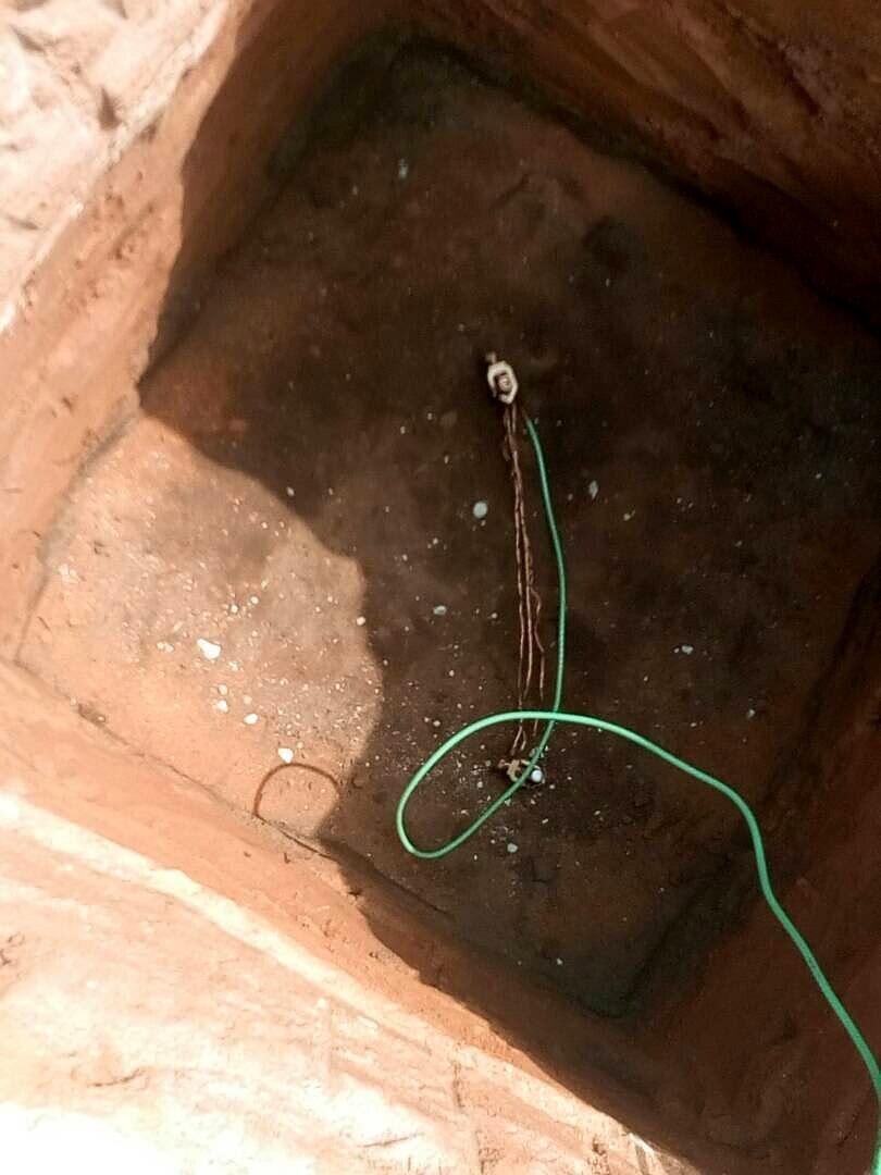 Earth pit with the earthing conductor